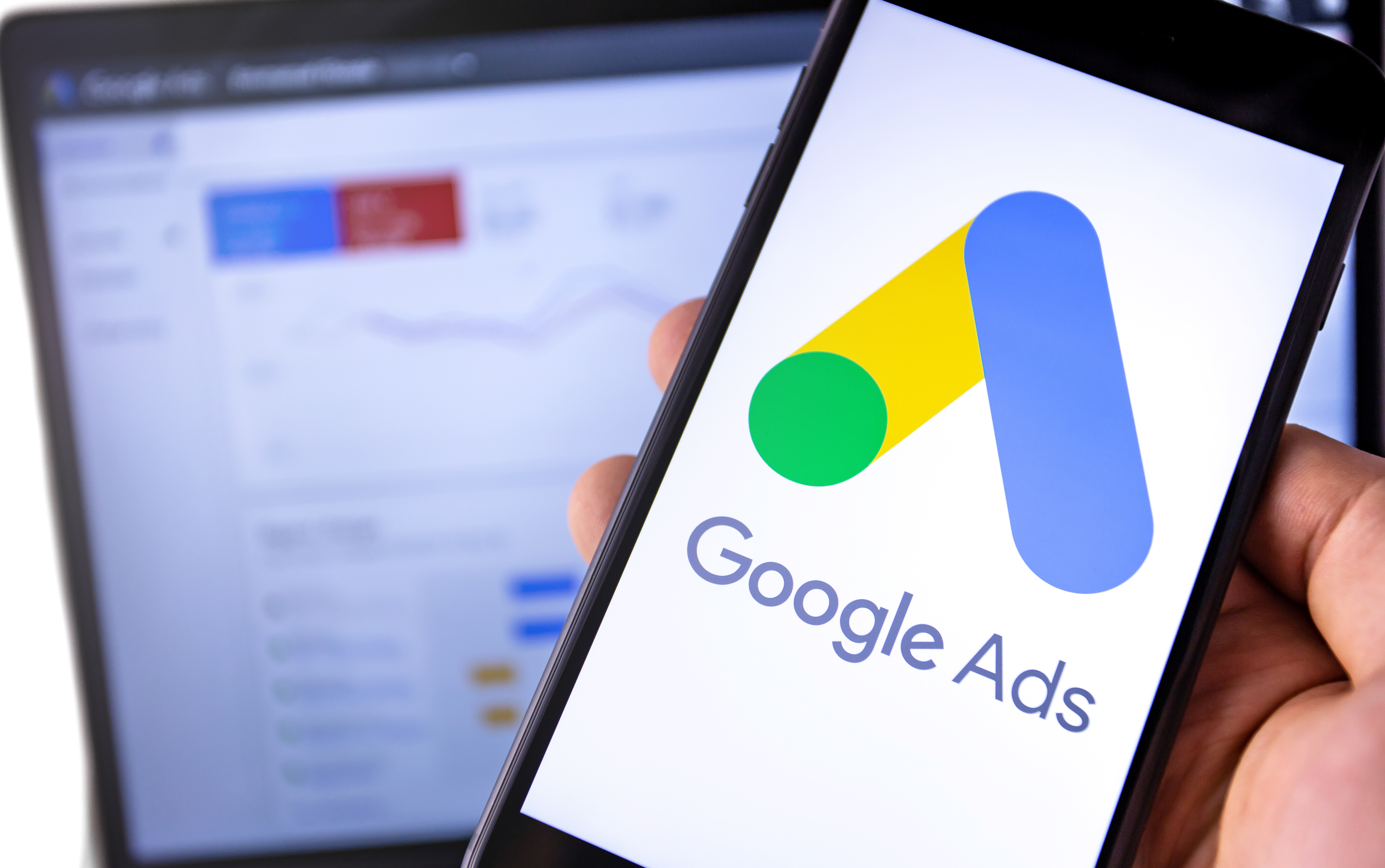 smartphone with Google Ads on the screen and display notebook background. Ads is a service of contextual, basically, search advertising from Google. Moscow, Russia - August 25, 2019 smartphone with Google Ads on the screen and display notebook background. Ads is a service of contextual, basically, search advertising from Google. Moscow, Russia - August 25, 2019
